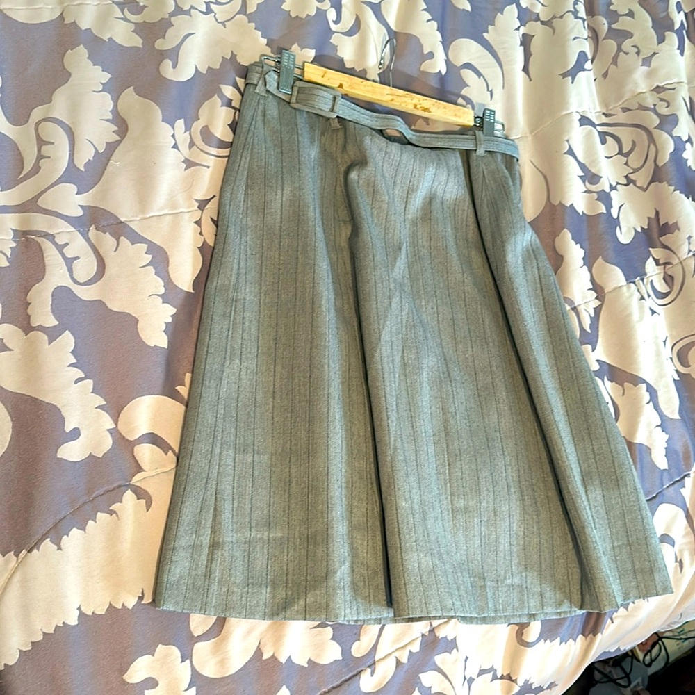 Beautiful business attire pinstriped skirt. Lined with belt. Size 14 tall,Xl.